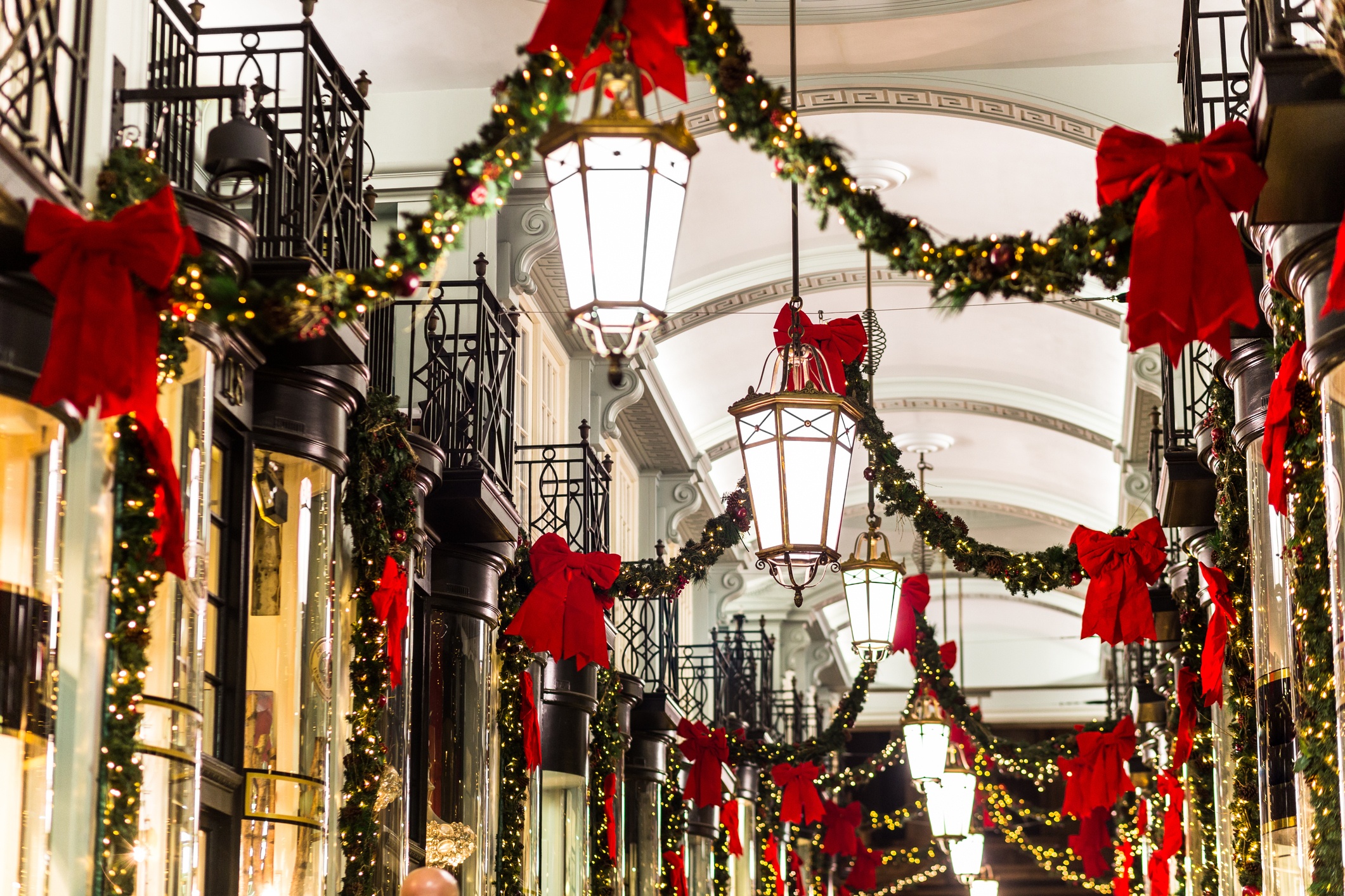 London Christmas shopping: Festive arcade perfect for gift shopping & holiday magic in the heart of London, UK.