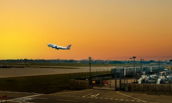 London Heathrow Airport: Plane taking off, airport departure, England, UK