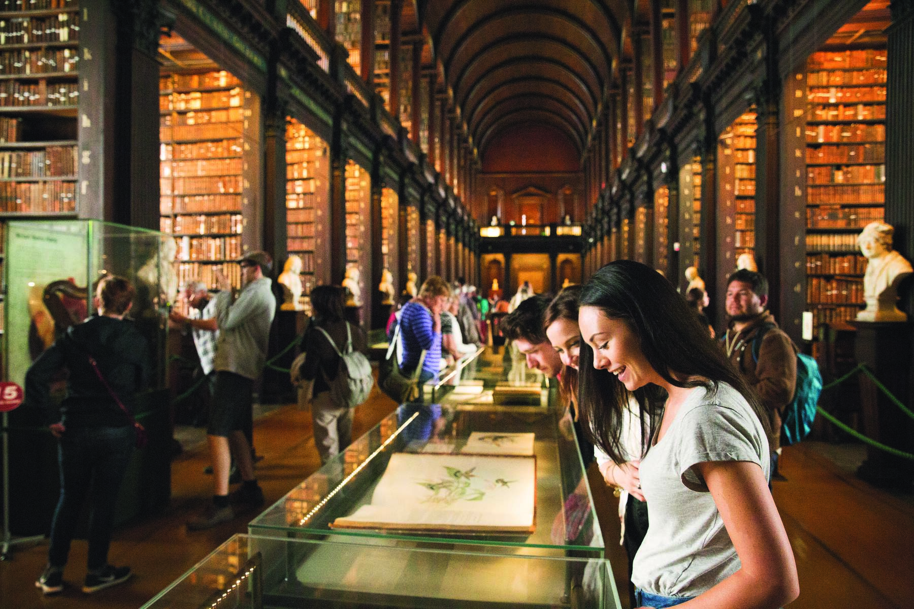 Trinity College Dublin's historic Long Room, a stunning 18th-century library with over 200,000 of Trinity College's oldest and most valuable books, attracting visitors and book lovers from around the world.