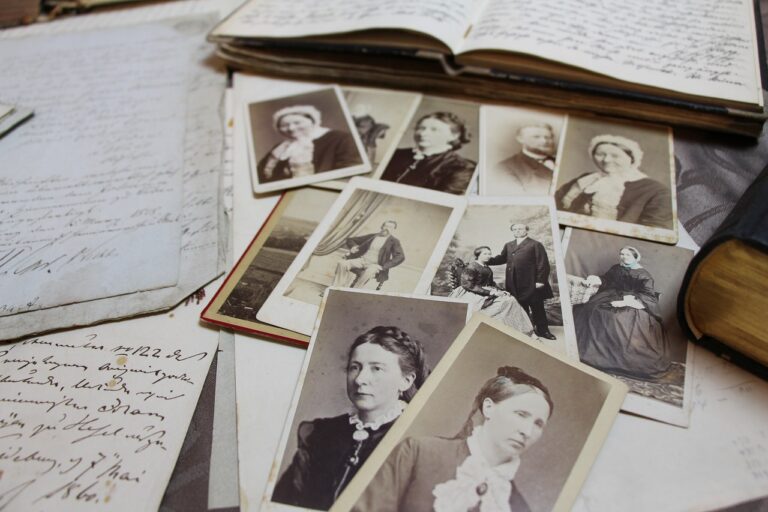 Old family photos laid out on a table